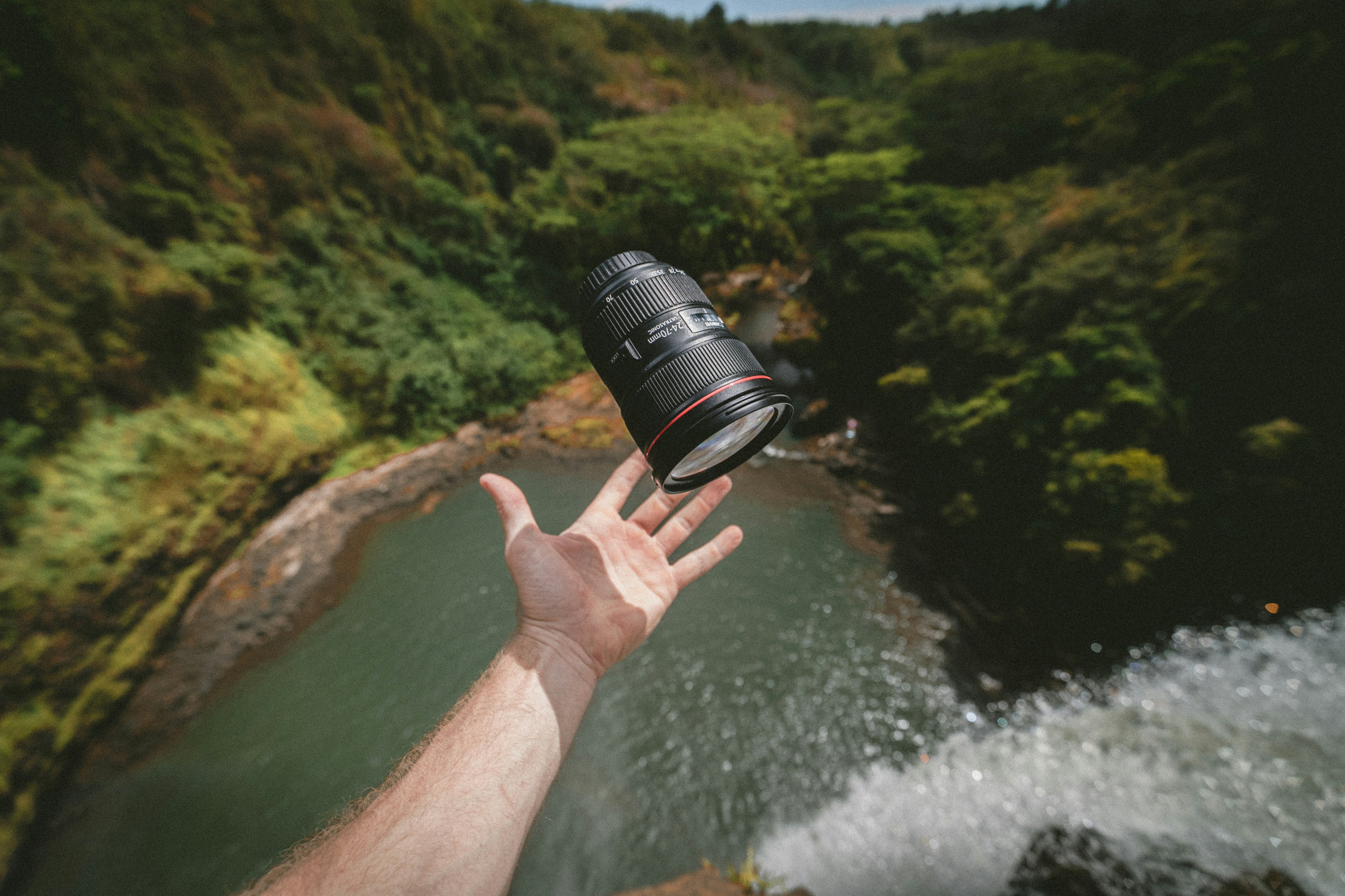 person about to catch lens